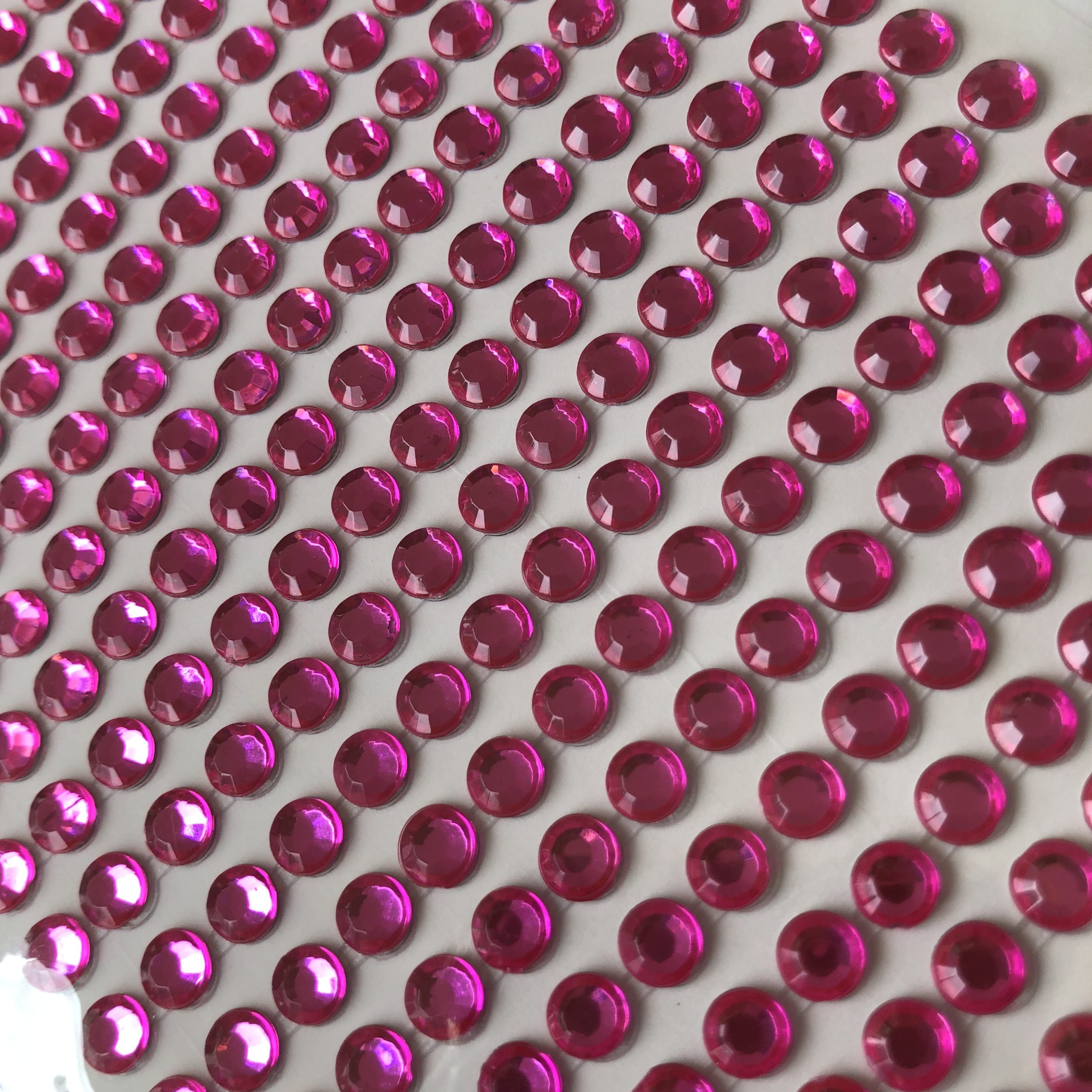 OJOS DIAMANTE ROSA 2mm - 50und