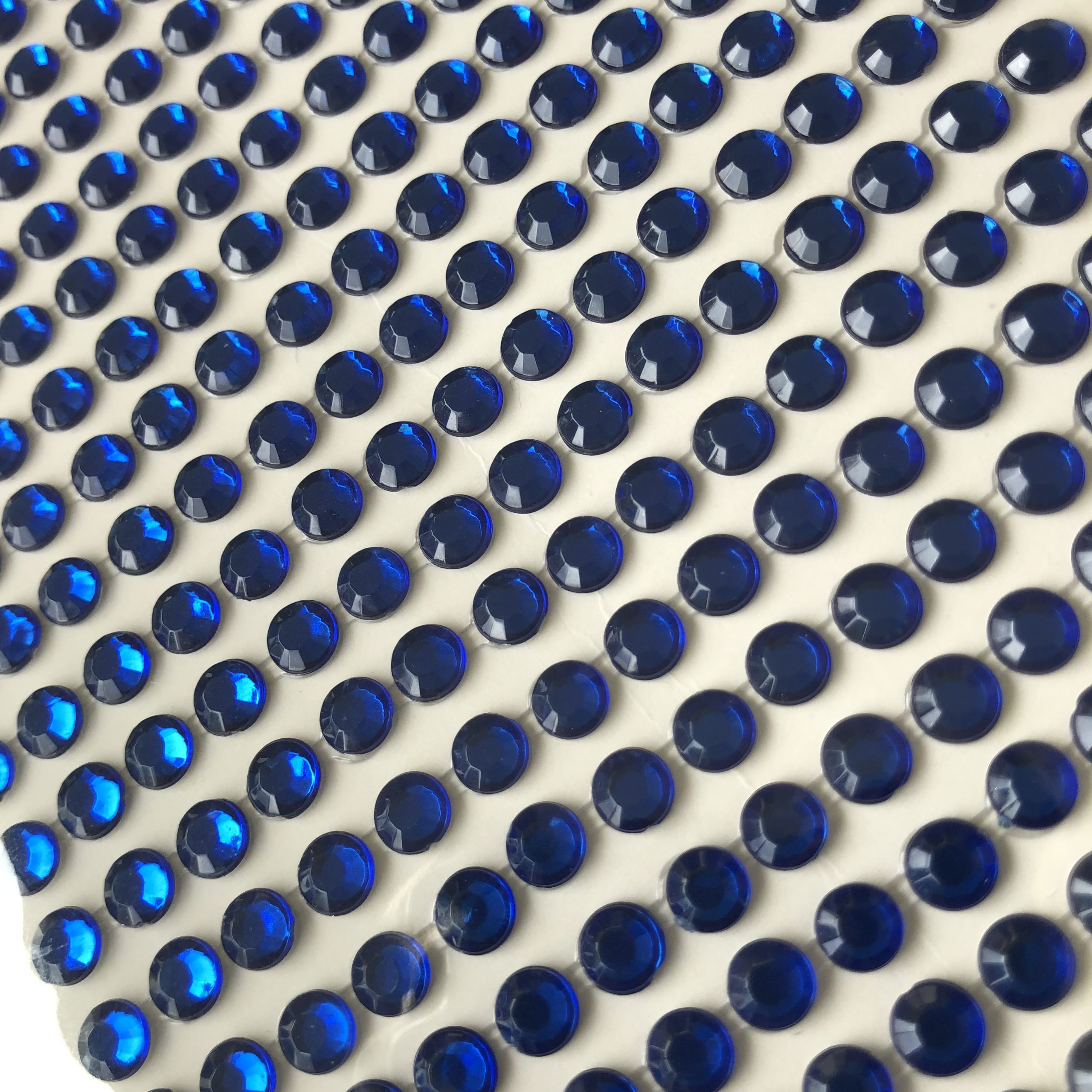 OJOS DIAMANTE AZUL 2mm - 50und